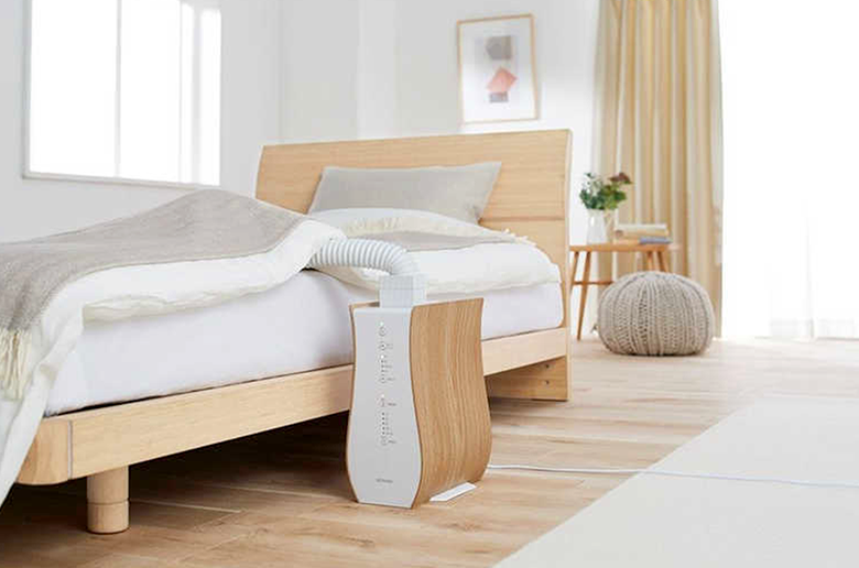 曲線が柔らかな木目が
調和したデザイン