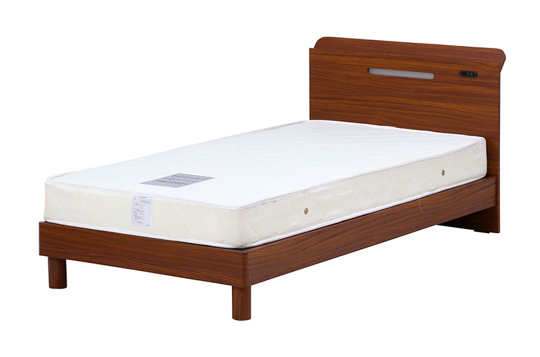 ヘッドボードとレトロな3Dペーパーが
特徴的な木製シングルベッド