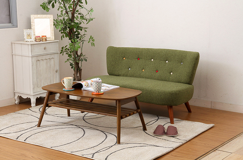 グリーンの生地にカラフルなボタンが付いた
とっても可愛いデザイン